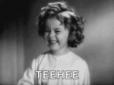 Little Girl Laughing In Black And White Saying Teehee GIF
