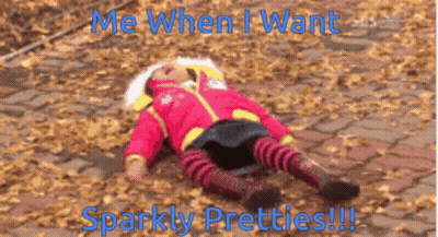 Little Girl Laying On Ground Me When I Want Sparkly Pretties GIF
