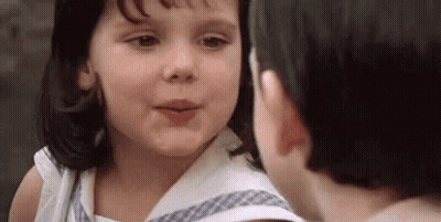 Little Girl Looking At Man's Face Close Up GIF