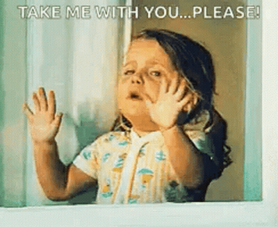Little Girl Making Face At Window GIF