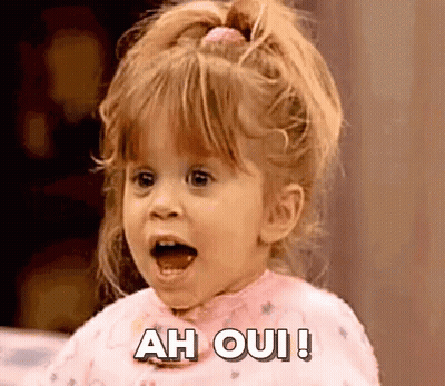 Little Girl Making Funny Face Saying Ah Oui GIF