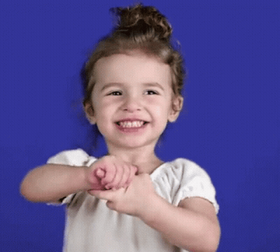 Little Girl Making Heart Shape With Hands GIF