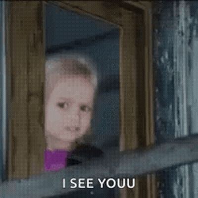 Little Girl Peeking Out Door Saying I See You GIF