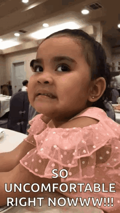 Little Girl Pink Dress Funny Face So Uncomfortable Right Now GIF