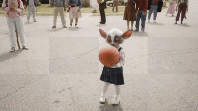 Little Girl Playing Basketball In Front Of Crowd GIF