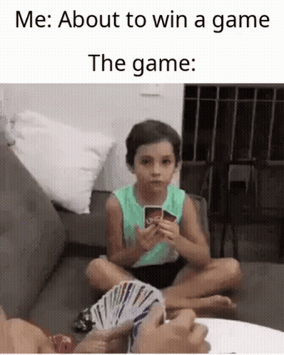 Little Girl Playing Uno On Couch GIF
