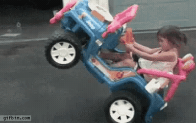 Little Girl Riding Blue Toy Jeep GIF