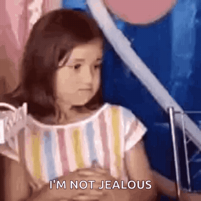 Little Girl Says I'm Not Jealous With Hands Folded GIF