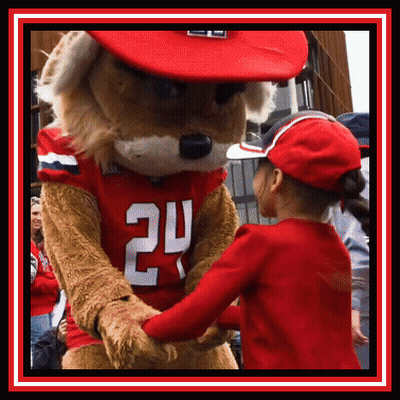 Little Girl Shakes Hands With Mascot Wearing Jersey 24 GIF