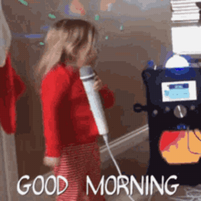 Little Girl Singing Into Microphone Saying Good Morning GIF
