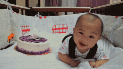 Little Girl Sitting At Table Thankful For Another Year GIF