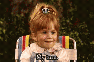 Little Girl Sitting In Beach Chair Saying My Turn GIF