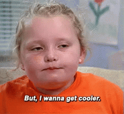 Little Girl Sitting On Couch Saying I Wanna Get Cooler GIF