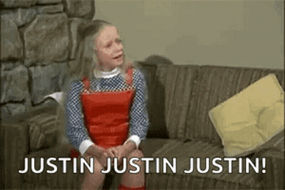 Little Girl Sitting On Couch Saying Justin Justin Justin GIF