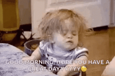 Little Girl Sitting On Floor Eyes Closed GIF
