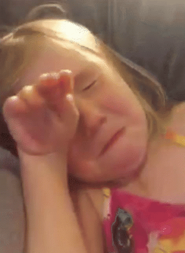 Little Girl Sleeping With Hand On Face GIF