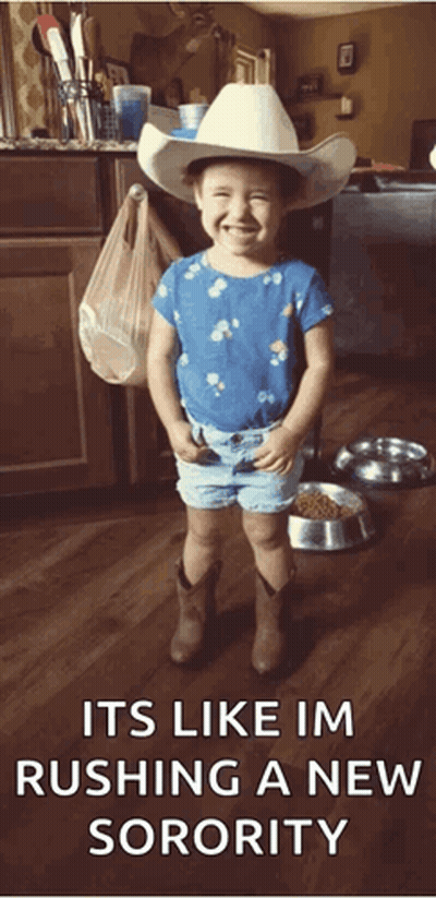 Little Girl Smiling In Cowboy Hat And Shorts GIF