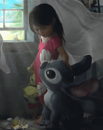 Little Girl Standing Next To Stitch Stuffed Animal GIF