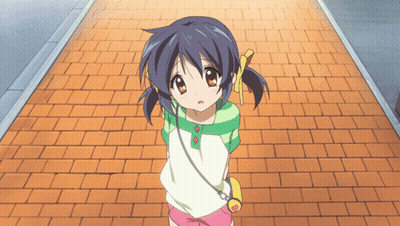 Little Girl Standing On Brick Sidewalk GIF