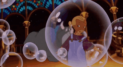 Little Girl Surrounded By Bubbles GIF