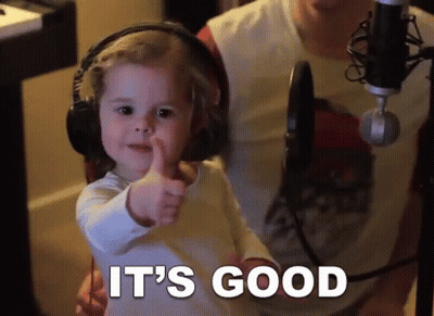 Little Girl Thumbs Up With Headphones And Microphone GIF