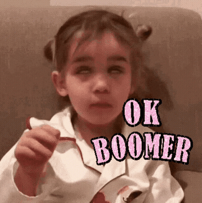 Little Girl Wearing White Jacket With Ok Boomer GIF