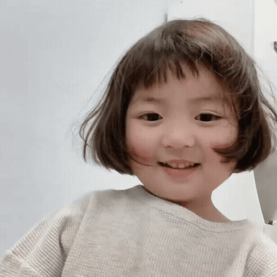 Little Girl With Bob Hairstyle Smiling GIF
