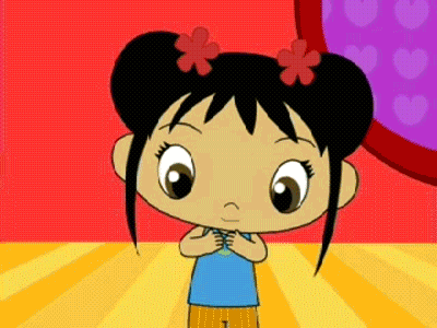 Little Girl With Flowers In Hair Against Red Wall GIF