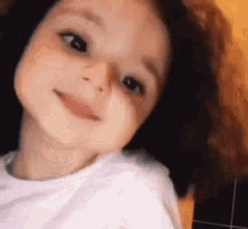 Little Girl With Long Hair Smiling GIF