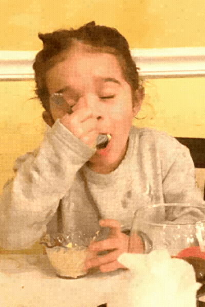 Little Girl With Spoon In Mouth GIF