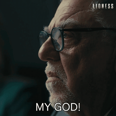 Little Man In Suit Dancing In Dark Room GIF