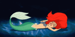 Little Mermaid Ariel Lying On Floor GIF