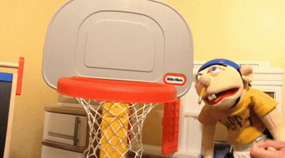 Little Tikes Basketball Hoop Next To Puppet GIF