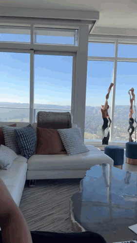 Living Room With Couch And Mountain View GIF
