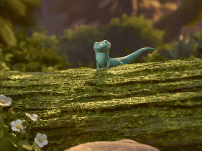 Lizard Standing On Mossy Log With Tongue Out GIF