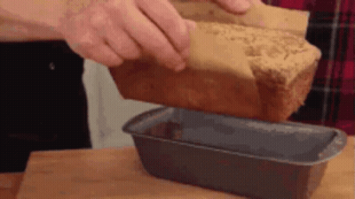 Loaf Of Bread Being Taken Out Of Loaf Pan GIF