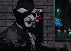 Lock And Load Man Wearing A Costume GIF