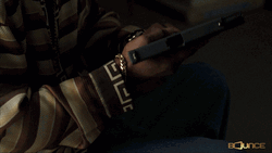 Lock And Load Man Wearing Striped Shirt GIF