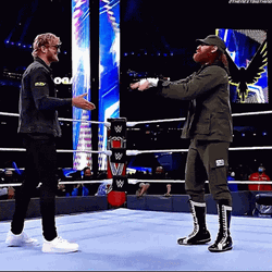 Logan Paul Wwe Hug Sami Zayn GIF