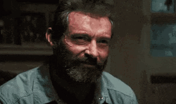 Logan Smiling With The Gal GIF