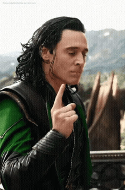 Loki From Avengers : Age Of Ultron Is Making A Funny Face While Holding His Finger To His Chin . GIF