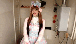 Lolita Cosplayer Waving Hello GIF