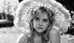 Lolita Wearing A Hat GIF
