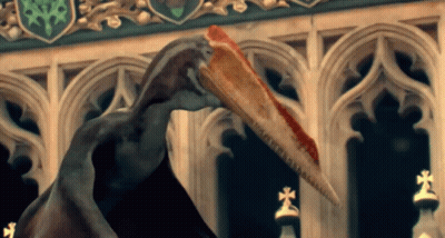 Long Beak Bird Statue Holding Pizza GIF
