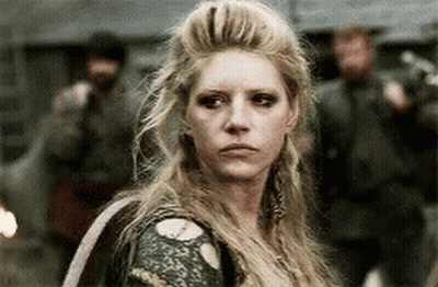 Long Blonde Hair Woman Standing Before Crowd GIF