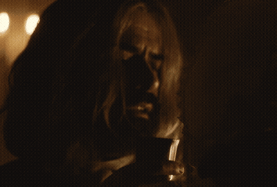 Long Hair Beard Man Looking Down In Dark GIF