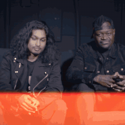 Long Hair Man Sitting Next To Short Hair Man GIF
