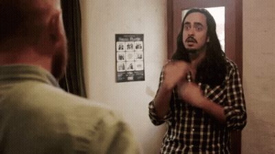 Long-Haired Bearded Man And Small Plants Poster GIF