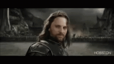 Long Haired Bearded Man At It's Coming Home Sign GIF