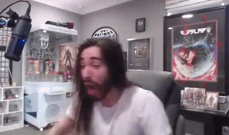 Long-Haired Bearded Man At Microphone GIF